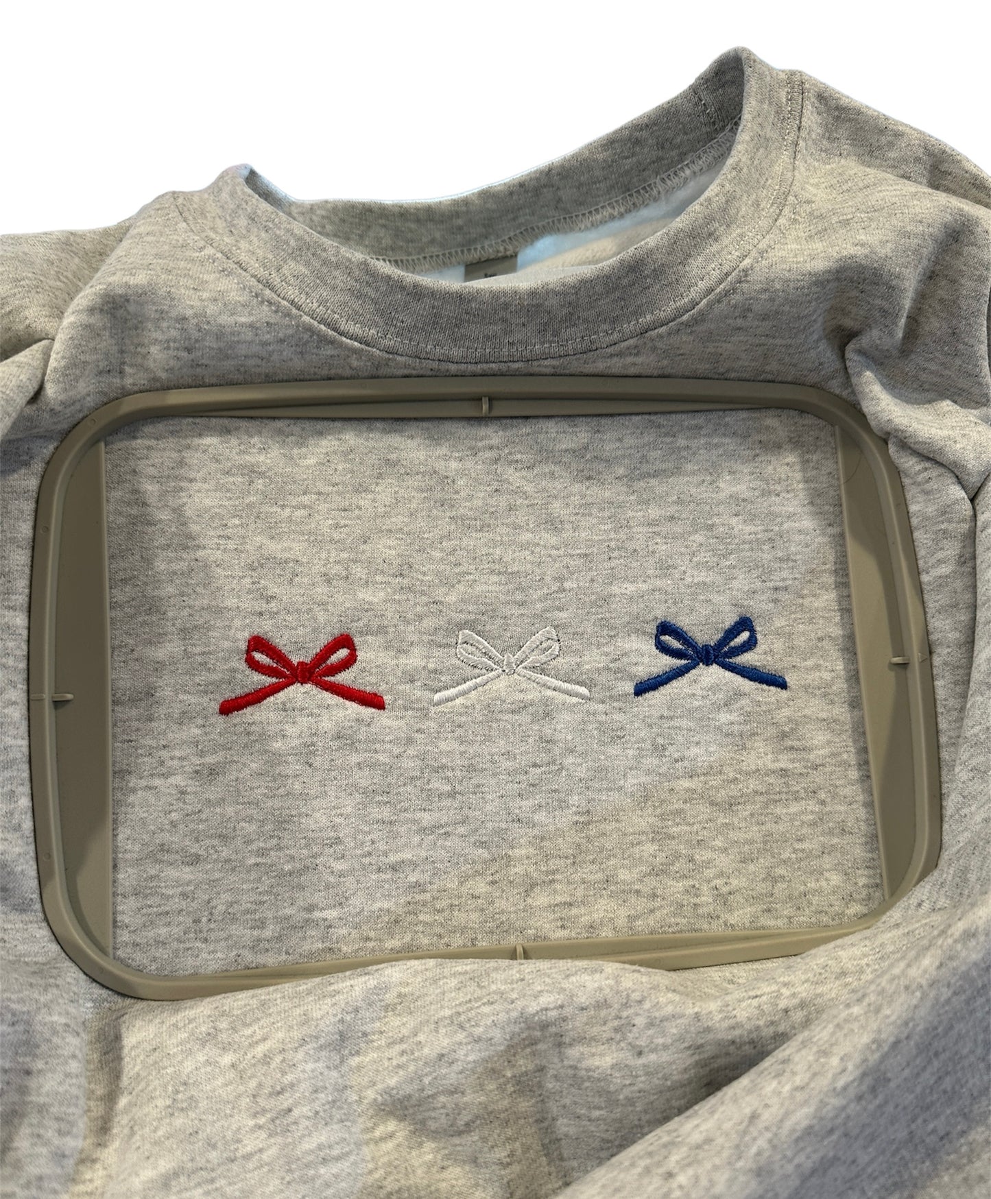 Red white and blue bow trio crew