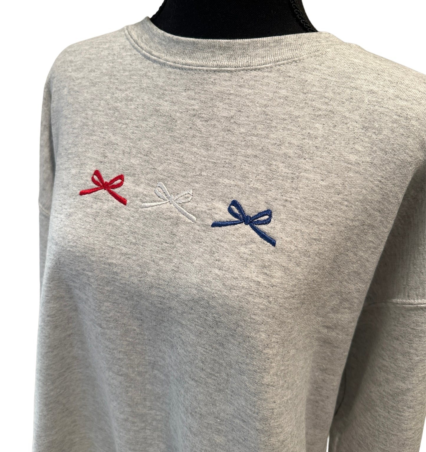Red white and blue bow trio crew