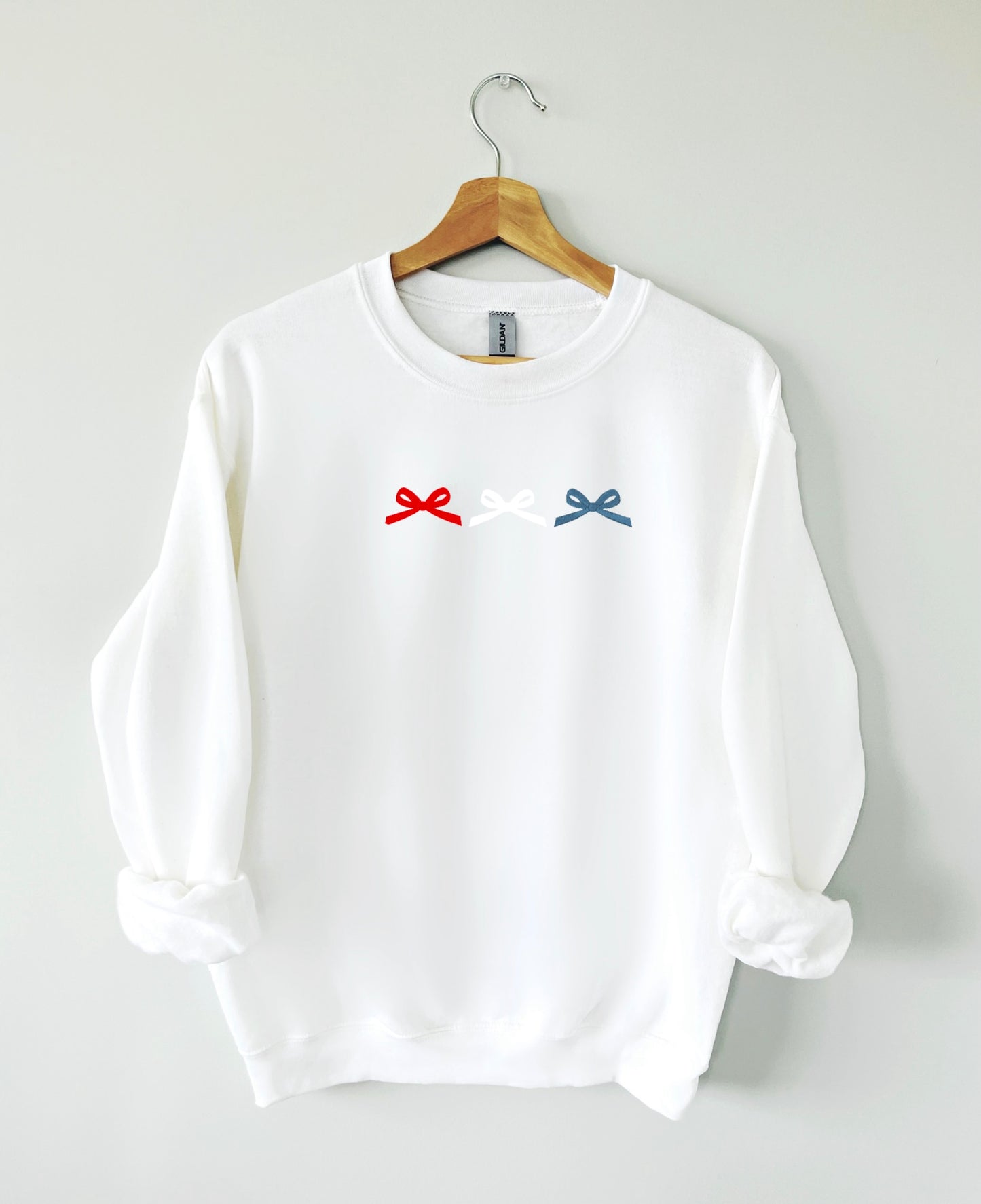 Red white and blue bow trio crew