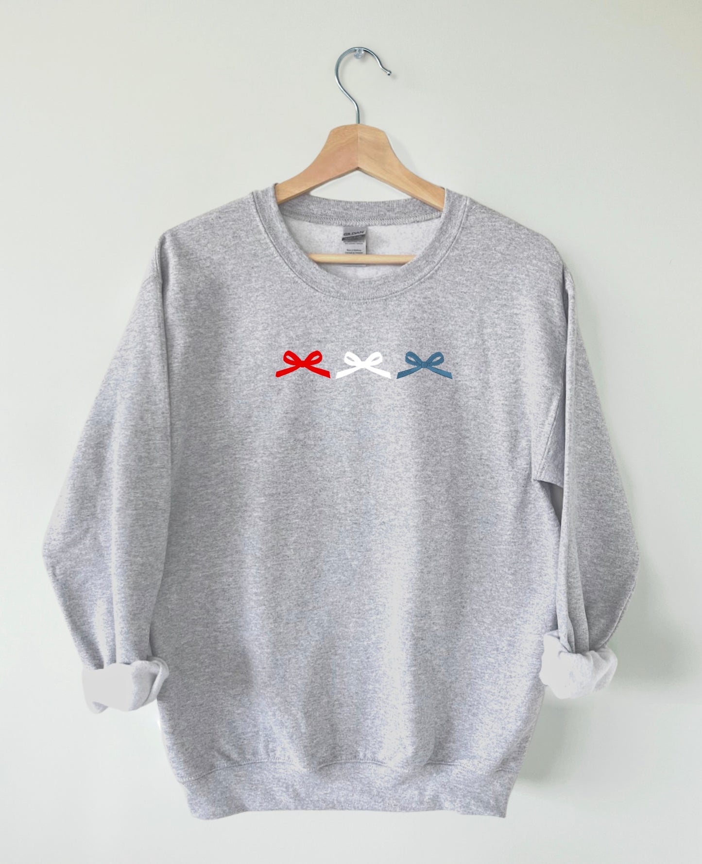 Red white and blue bow trio crew