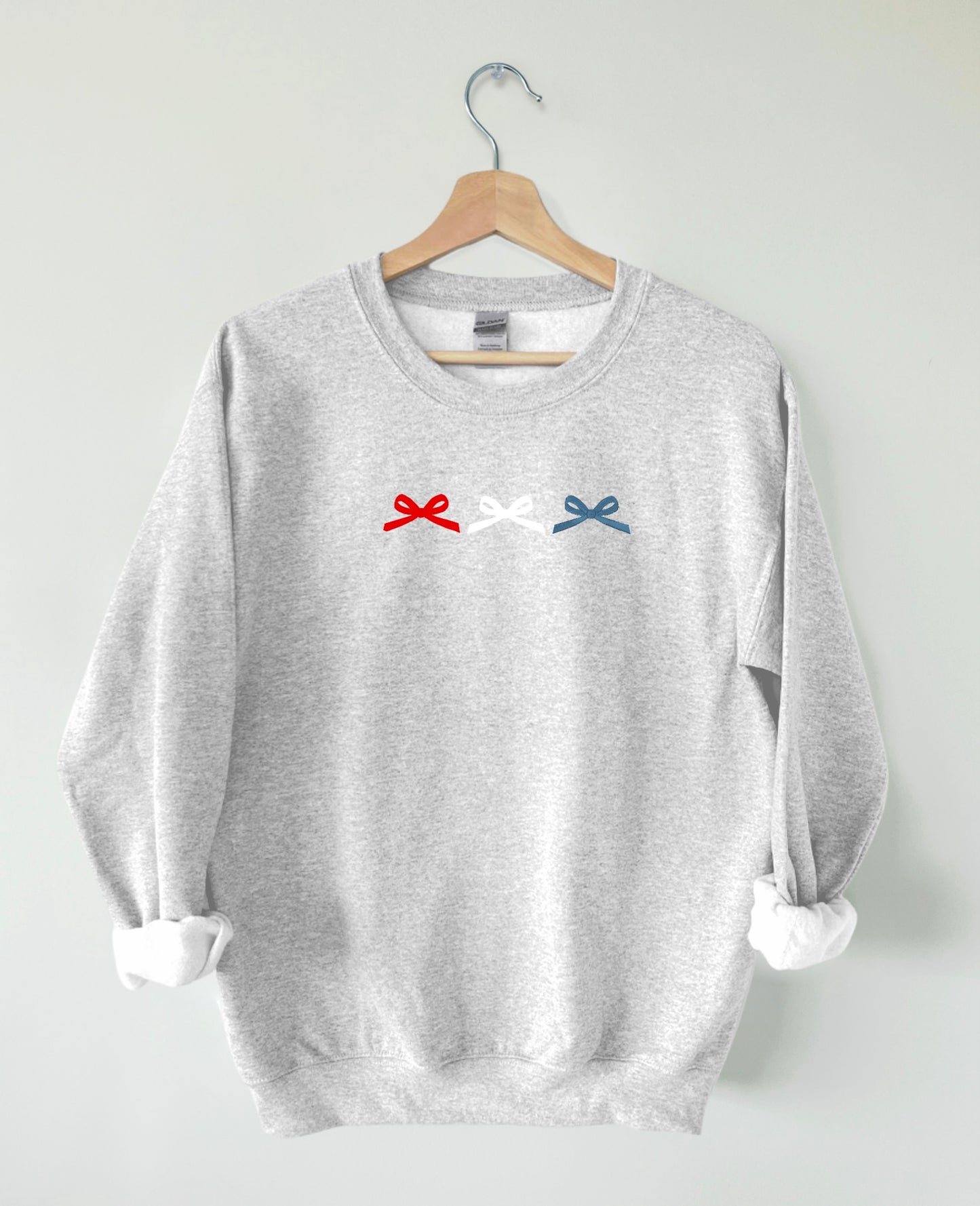 Red white and blue bow trio crew