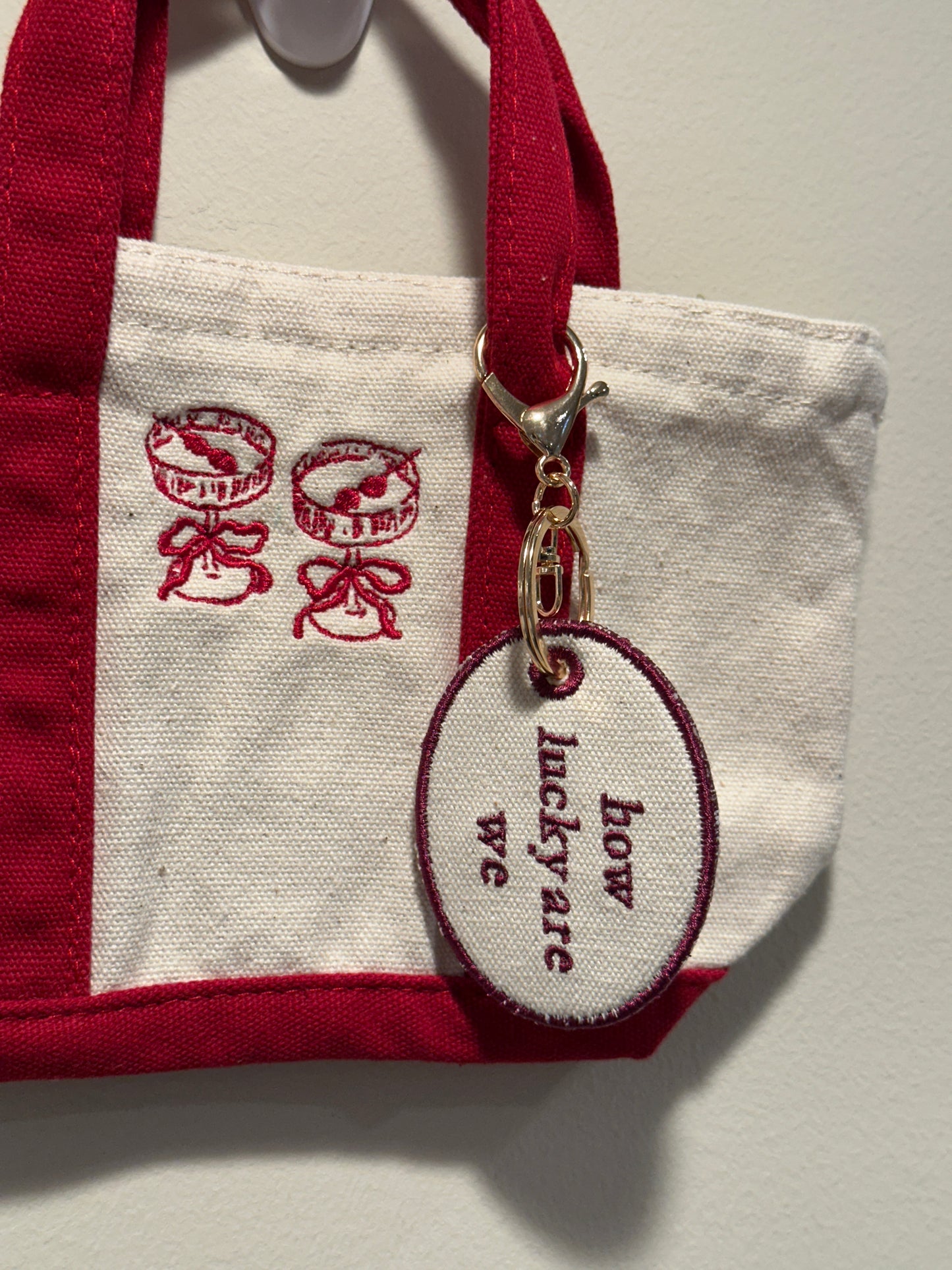 How Lucky Are We Charm  - Custom Embroidered Keychain Tag