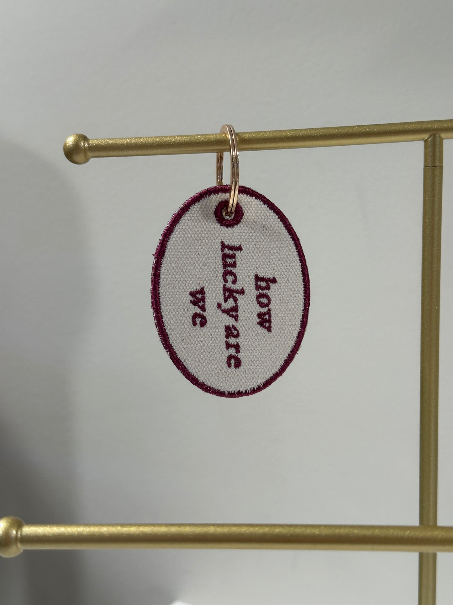 How Lucky Are We Charm  - Custom Embroidered Keychain Tag